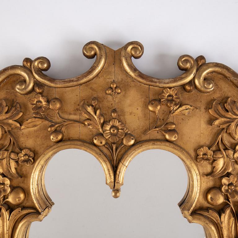 A late 19th century bronzed mirror.
