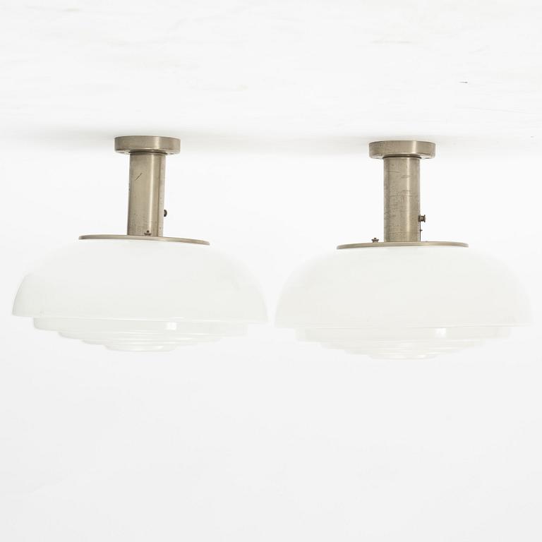 Harald Notini, a pair of ceiling lamps, model "11321", Arvid Böhlmarks Lampfabrik, 1940s.