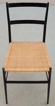 A Gio Ponti 'Superleggera' chair, Cassina, Italy, black painted ash with ratten seat.