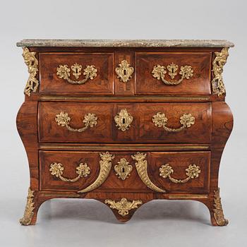 A Swedish early rococo parquetry, ormolu-mounted and marble commode, presumably by S. Pasch or J. Wulf , ca. 1740.