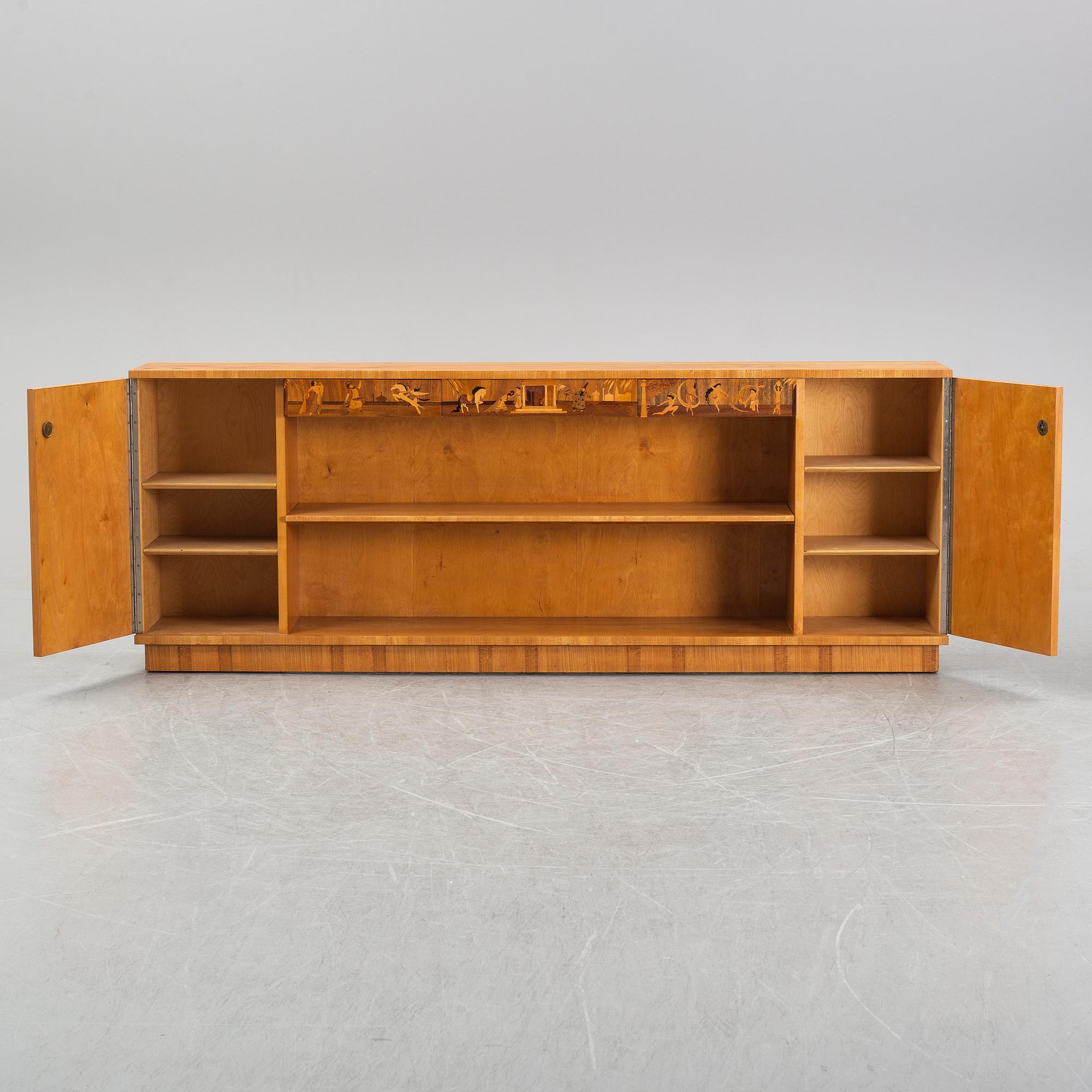 An inlaid bookcase from Mjölby Intarsia, 1930's.