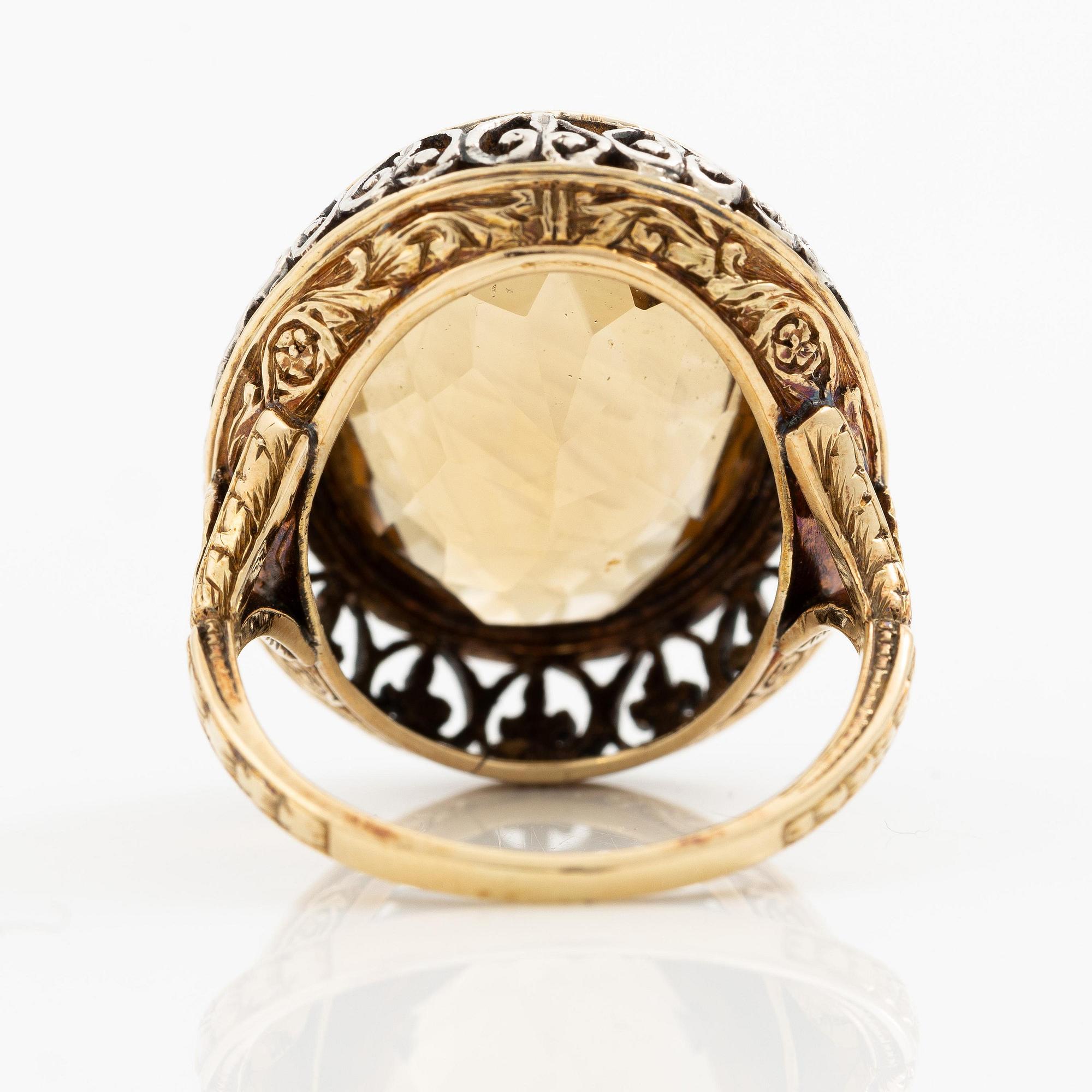 Ring 14K guld och silver med en fasettslipad citrin.