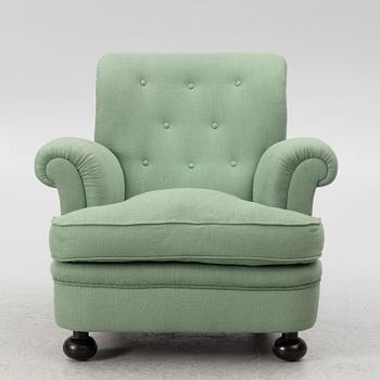 Josef Frank, a model 336 armchair, Firma Svenskt Tenn, Sweden.
