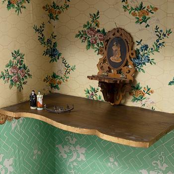 An 18th century cabinet / doll's house.