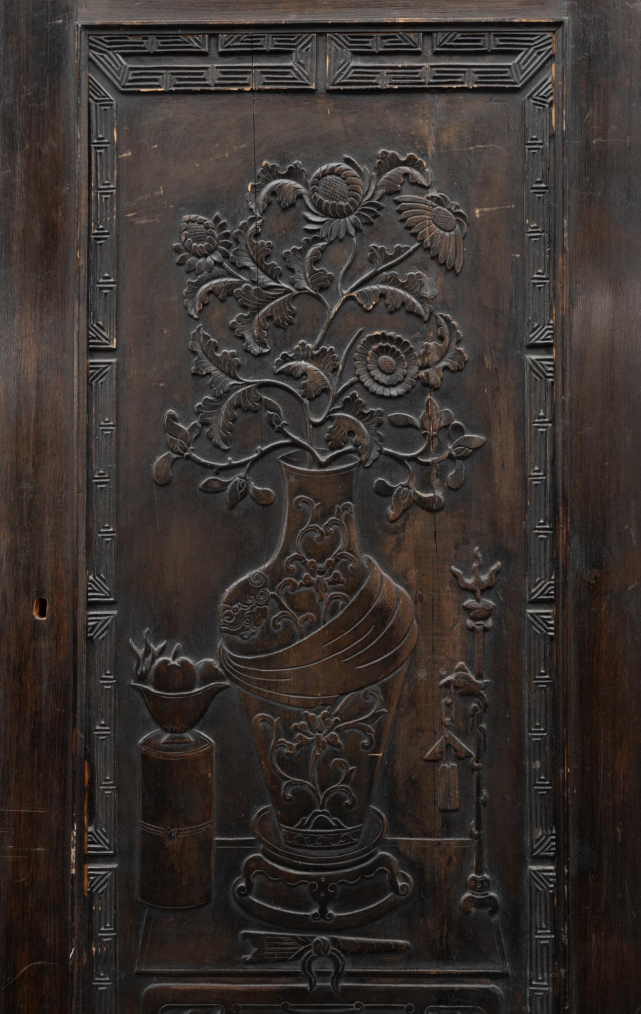 A Chinese wooden panel, Qing dynasty, 19th century.