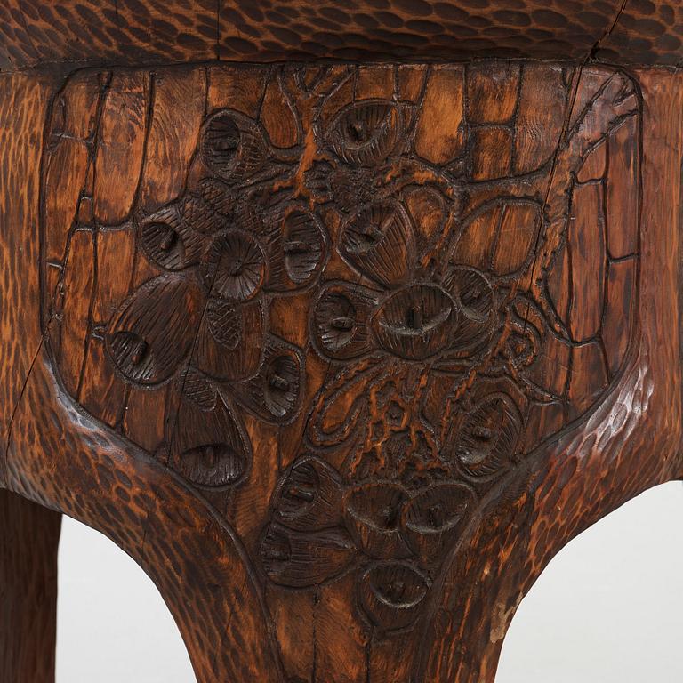 A Gustav Fjaestad Art Nouveau carved pine table by Adolf Swanson, Arvika, Sweden 1908.