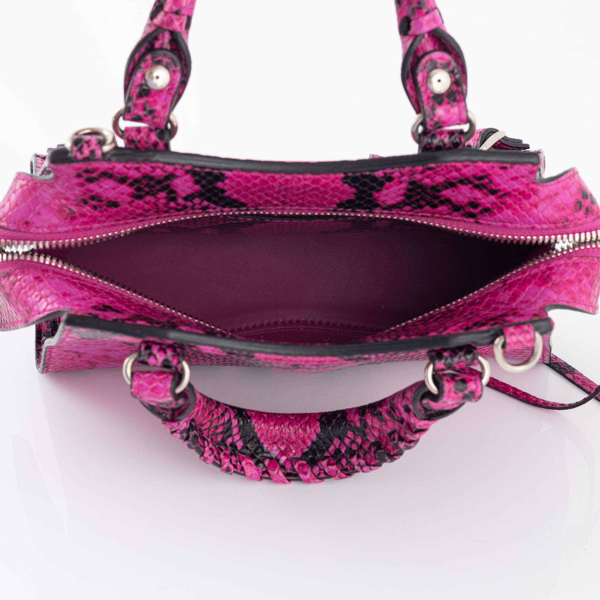 Balenciaga, A 'Mini Neo Classic City Python bag'.