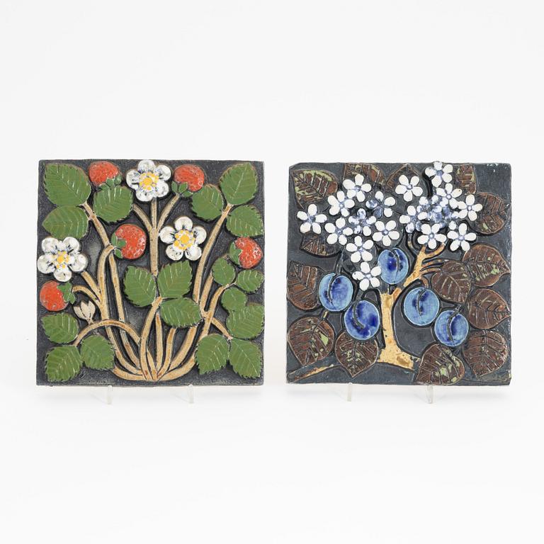 Lisa Larson, a group of three stoneware wall reliefs and two ashtrays, Gustavsberg.