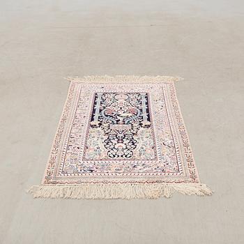 Oriental silk rug, approximately 122x77 cm.