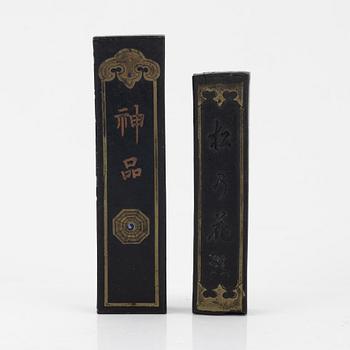 A set of four stone scholars objects and a enameled silver box with cover, Qing dynasty, circa 1900.