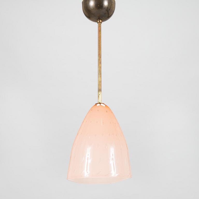 Gunnel Nyman, kattovalaisin, malli 50597, Idman 1900-luvun puoliväli.