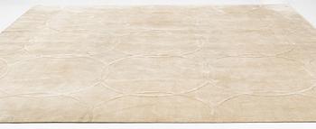 A carpet 360 x 360 cm.