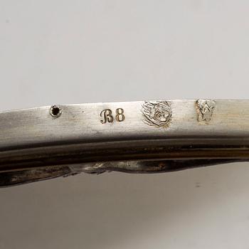 A pair of pewter wall sconces, Firma Svenskt Tenn, model no 245, Stockholm 1928.