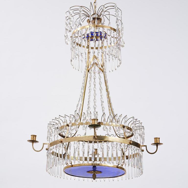 A late-Gustavian five-light gilt brass and cut glass chandelier, Stockholm, late 18th century.