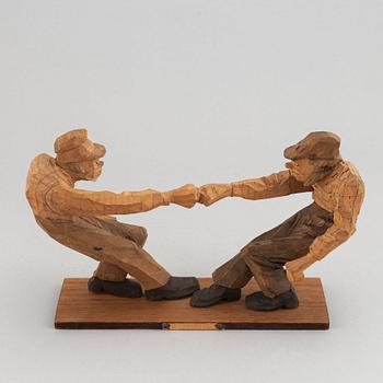 A Carl Johan Trygg wooden sculpture, signed and dated 1918.