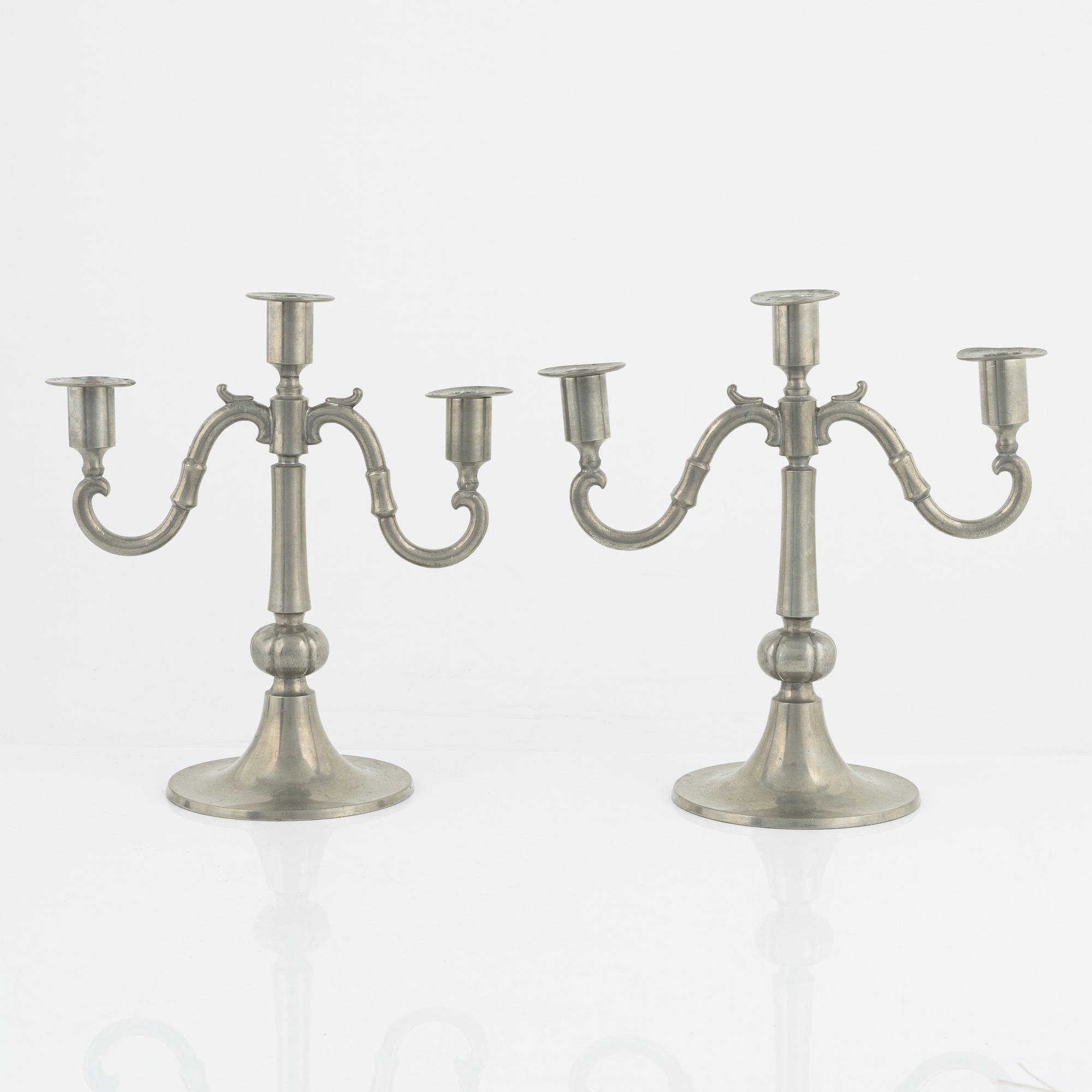 Edvin Ollers, a pair of pewter candelabra, Stockholm, 1922.