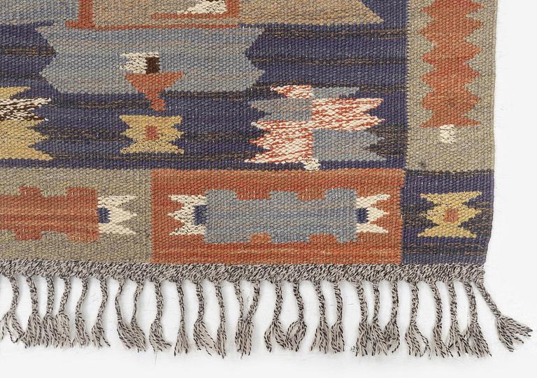 Märta Måås-Fjetterström, a carpet, 'Tolvbladsmattan', flat weave, c. 205 x 95 cm, signed MMF.