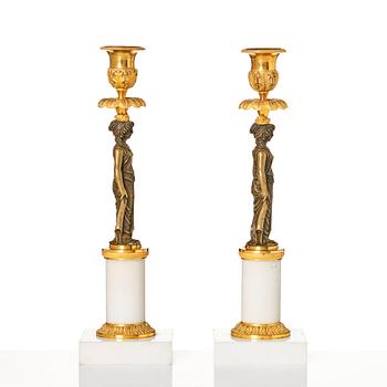 A pair of late Gustavian ormolu, patinated bronze, and marble candlessticks attributed to F. L. Rung (1758-1837).