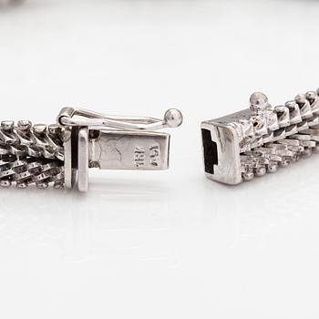 Rannekoru, 18K valkokultaa, safiireja ja timantteja n. 0.18 ct yht.