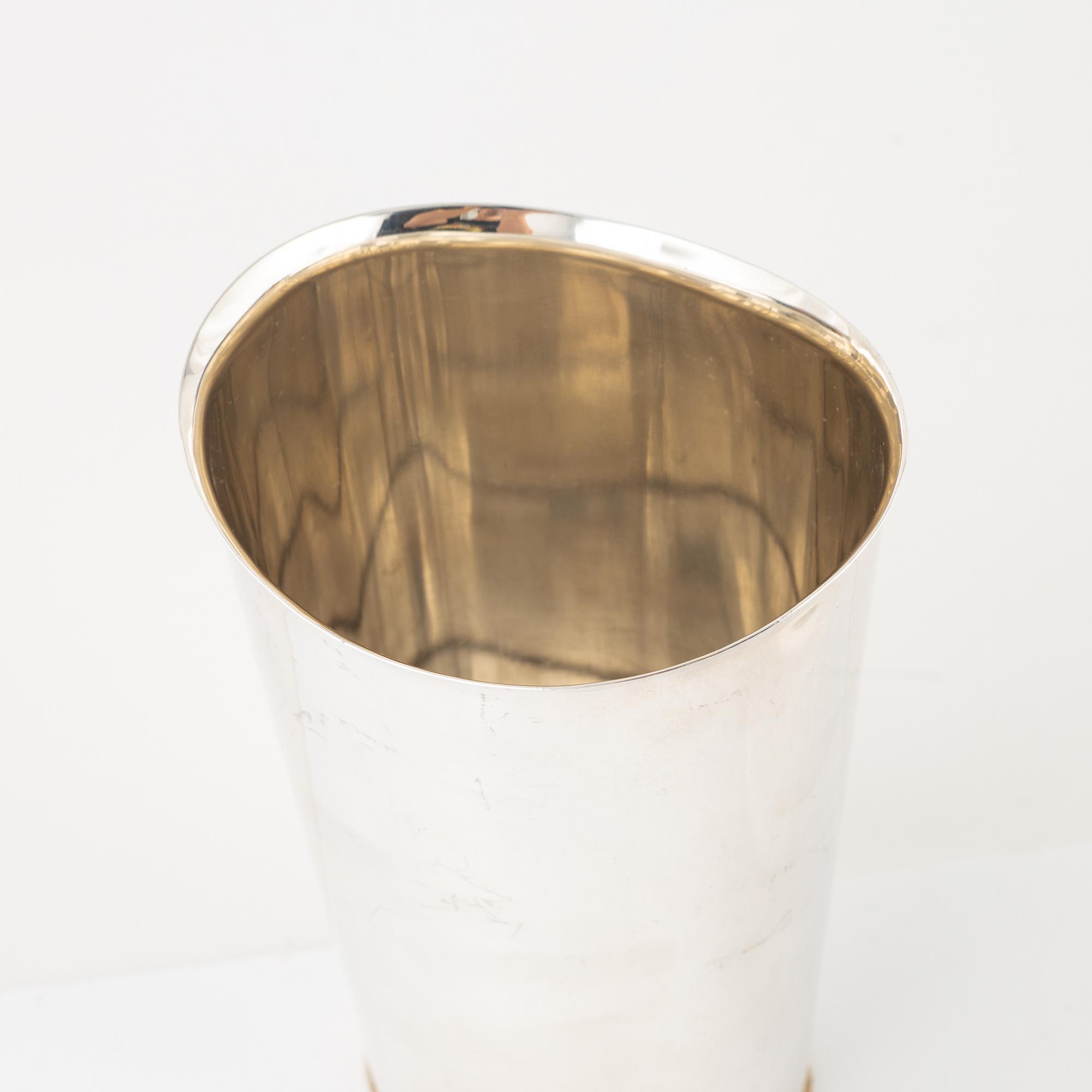 A silver vase and two bowls, Sweden, 1961-76.