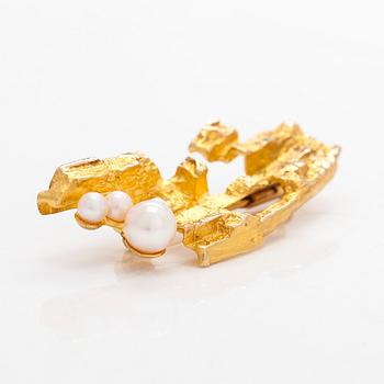 Björn Weckström, A 14K gold 'Bow of Argo' brooch with cultured pearls for Lapponia 1972.