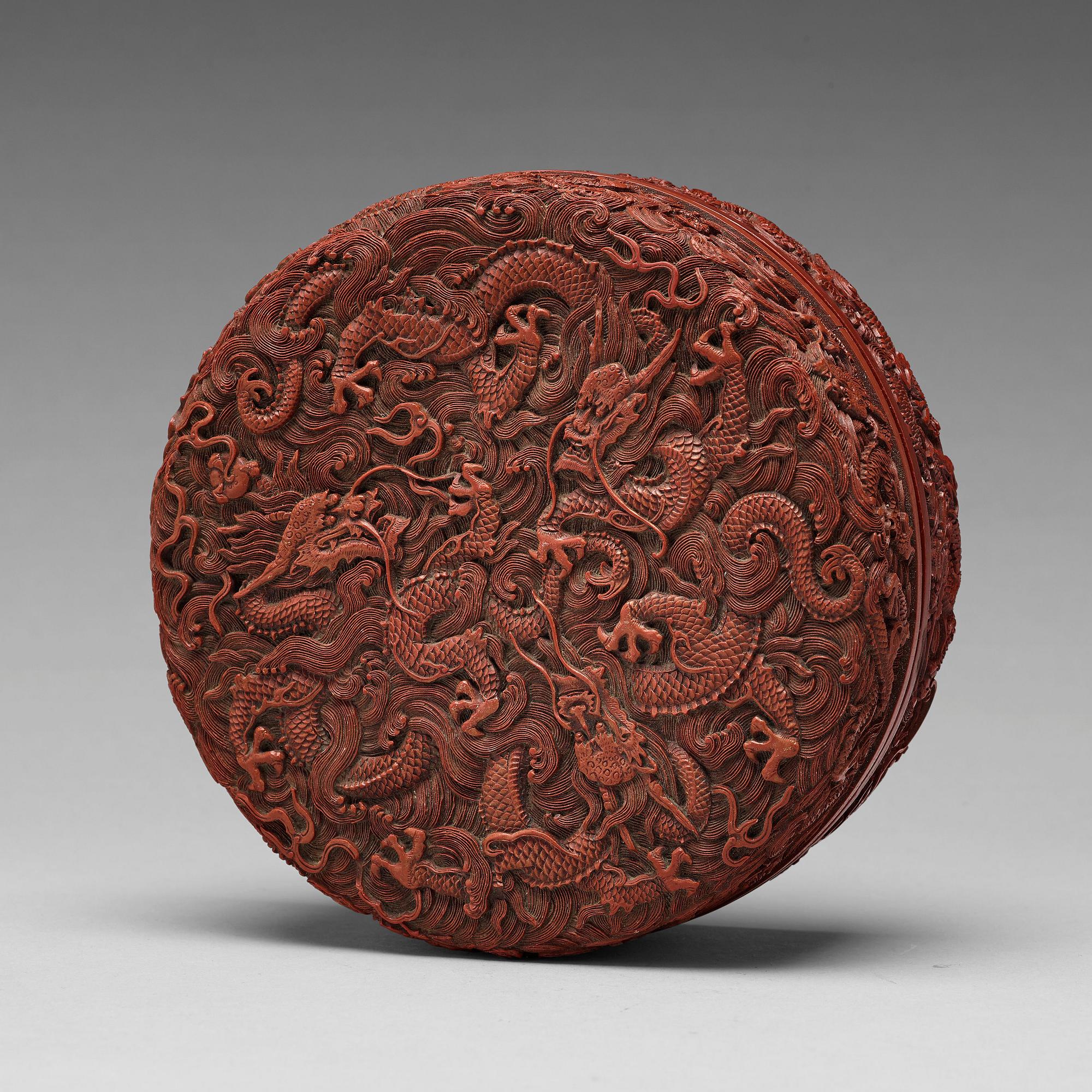A red lacquer box with cover, Qing dynasty, with Qianlong six character mark.