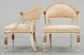 Two matched late Gustavian early 19th Century armchairs.