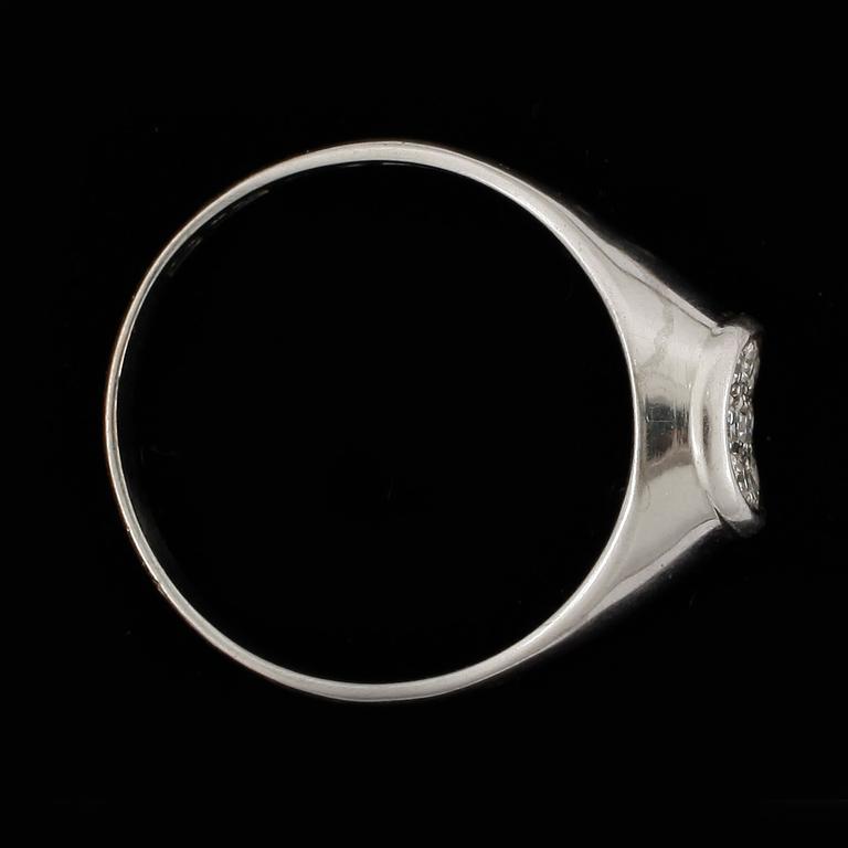 RING, 18k vitguld samt briljantslipade diamanter, tot 0,18 ct. Vikt ca 4 g.