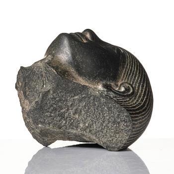 An Egyptian basalt head of a man, Grand tour, 19th century.
