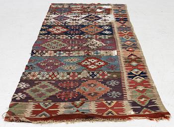 An antique kilim fragment, central Anatolia, c. 238 x 82 cm.