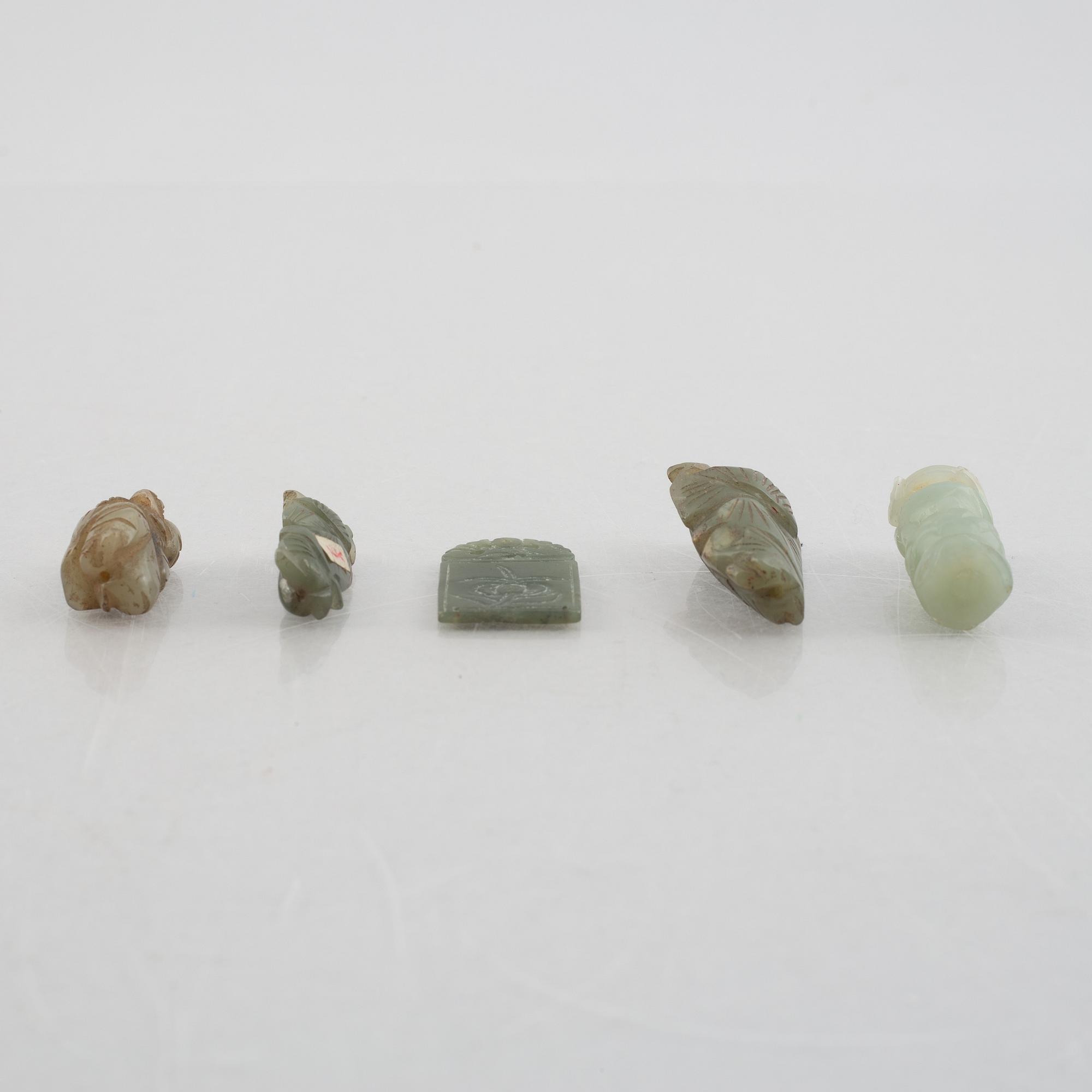 A group of five Chinese stone charms, 20th century.