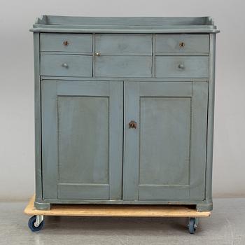 A mid 19th century painted cupboard.