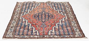 An oriental rug, circa 195 x 140 cm.