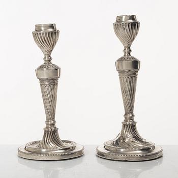 A pair of English silver candelabra, mark of Hawksworth, Eyre & Co Ltd, Sheffield 1892.