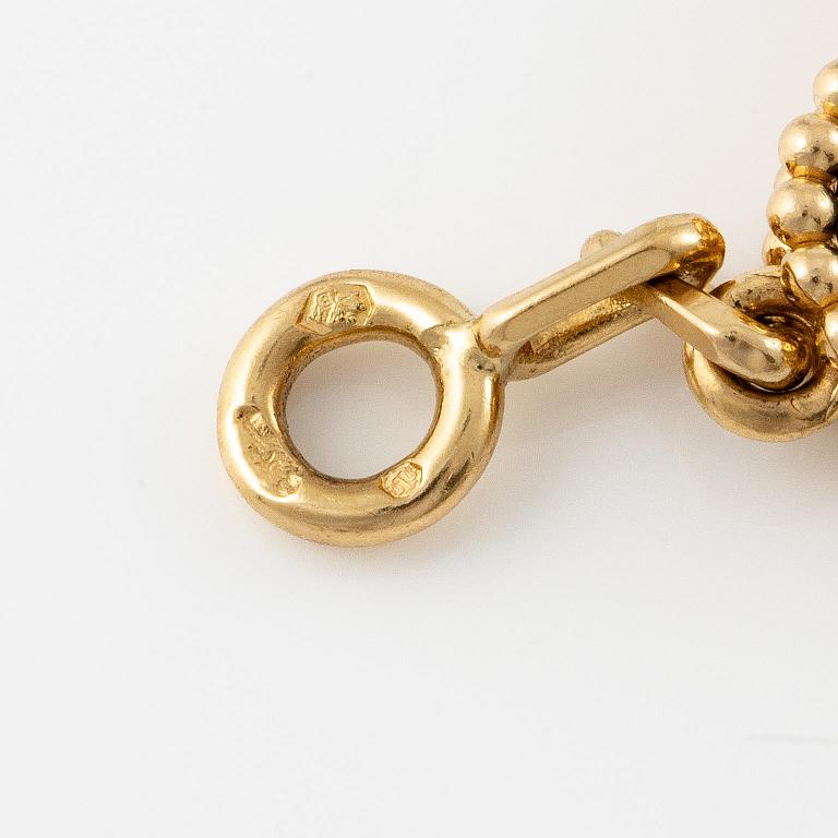 A Van Cleef & Arpels bracelet "Alhambra" 18K gold with onyx.