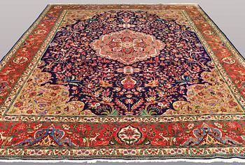 A CARPET, Figural Tabriz, ca 407 x 304 cm.