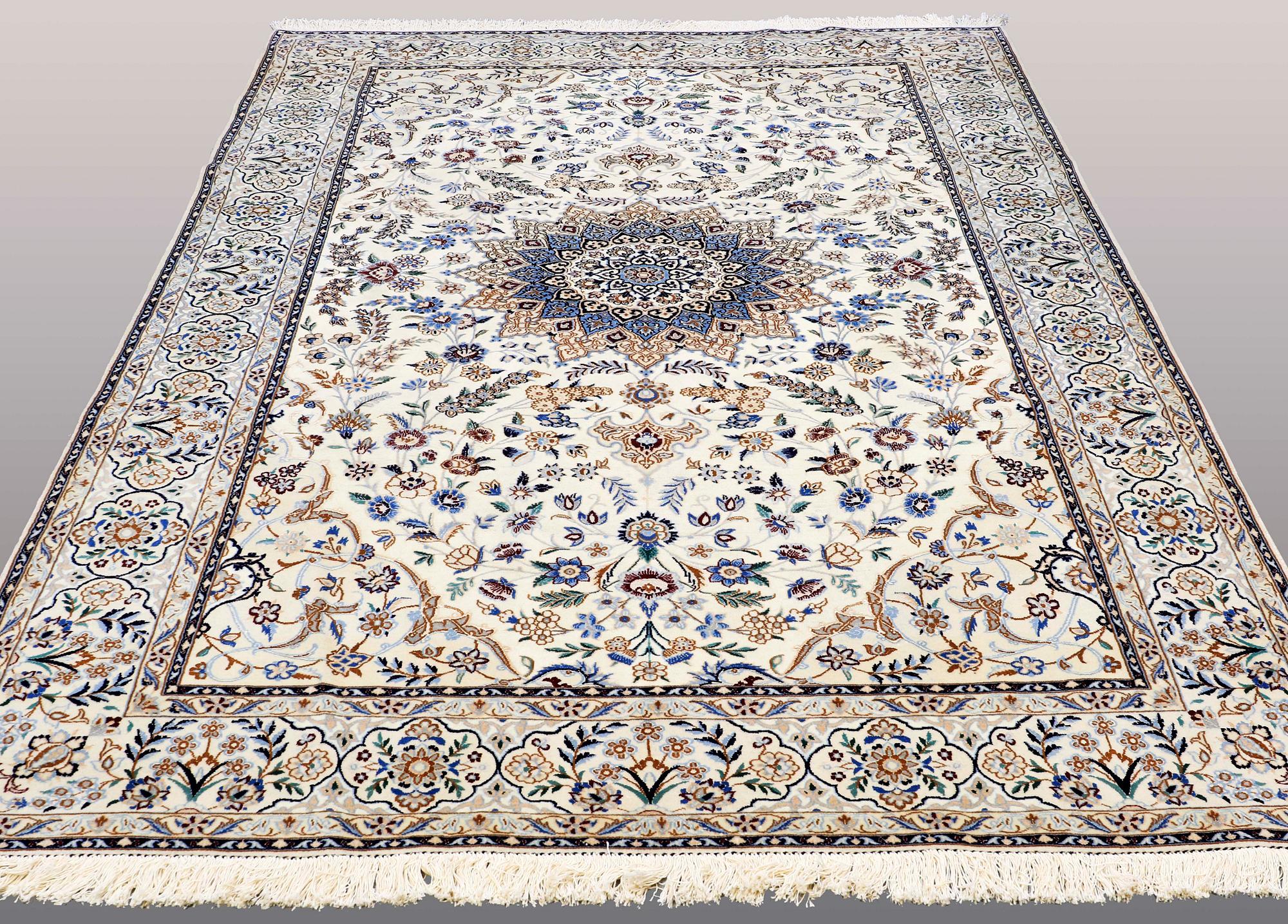 A CARPET, Nain part silk, so called 9 LAA, ca 307 x 210 cm.
