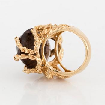 A smoky quartz cocktail ring.