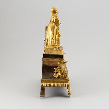 A rococo style brass mantle clock, second half of the 19th Century.