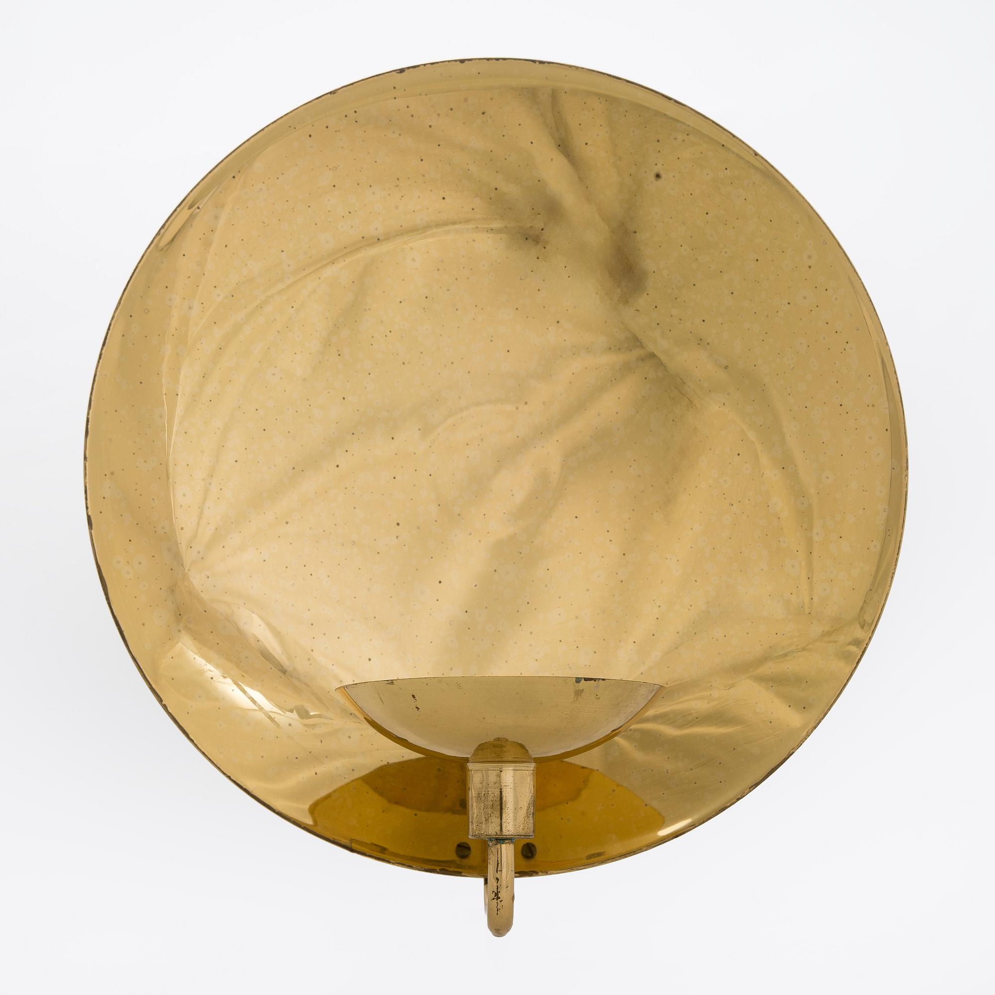 Kaija Aarikka, a late 20th century wall sconce for Aarikka Finland.