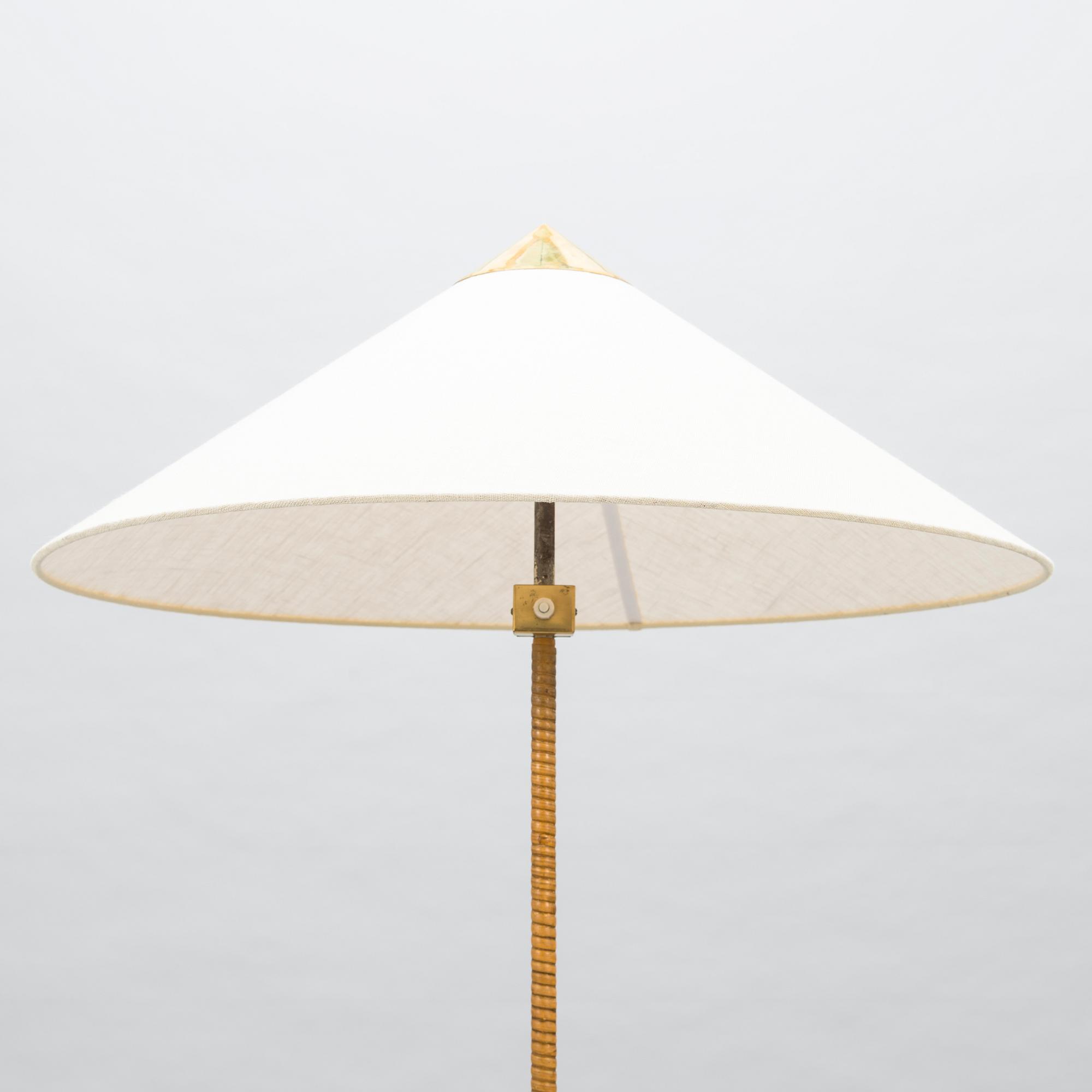 PAAVO TYNELL, A mid-20th century floor lamp for Taito, Finland.
