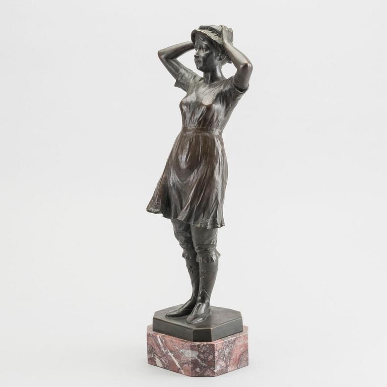 HUGO HECK, a signed and dated bronze sculpture.