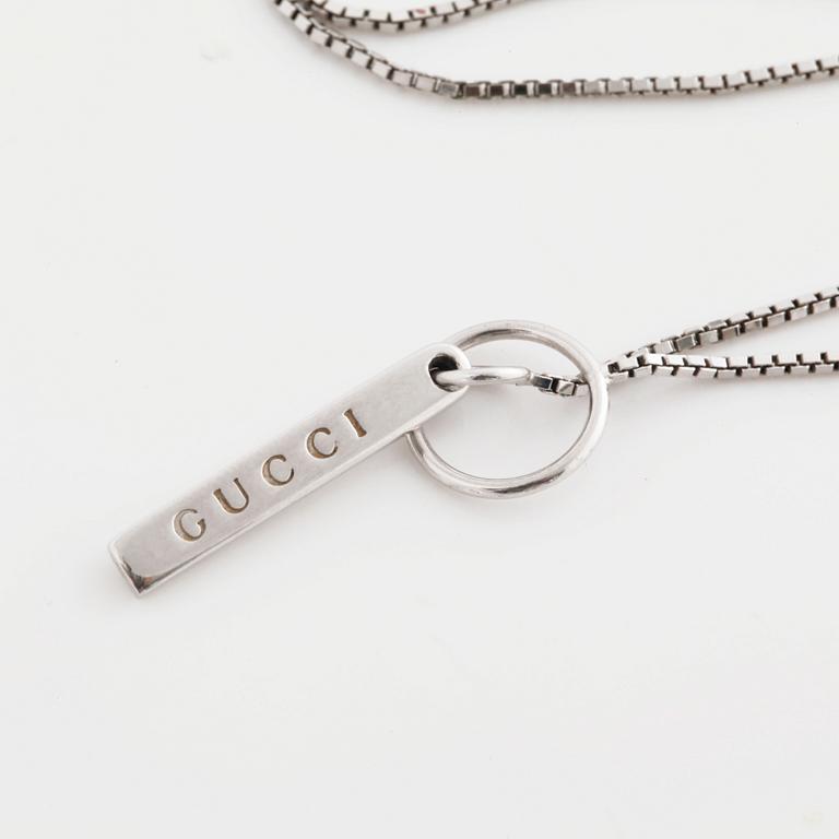 A necklace by Gucci.