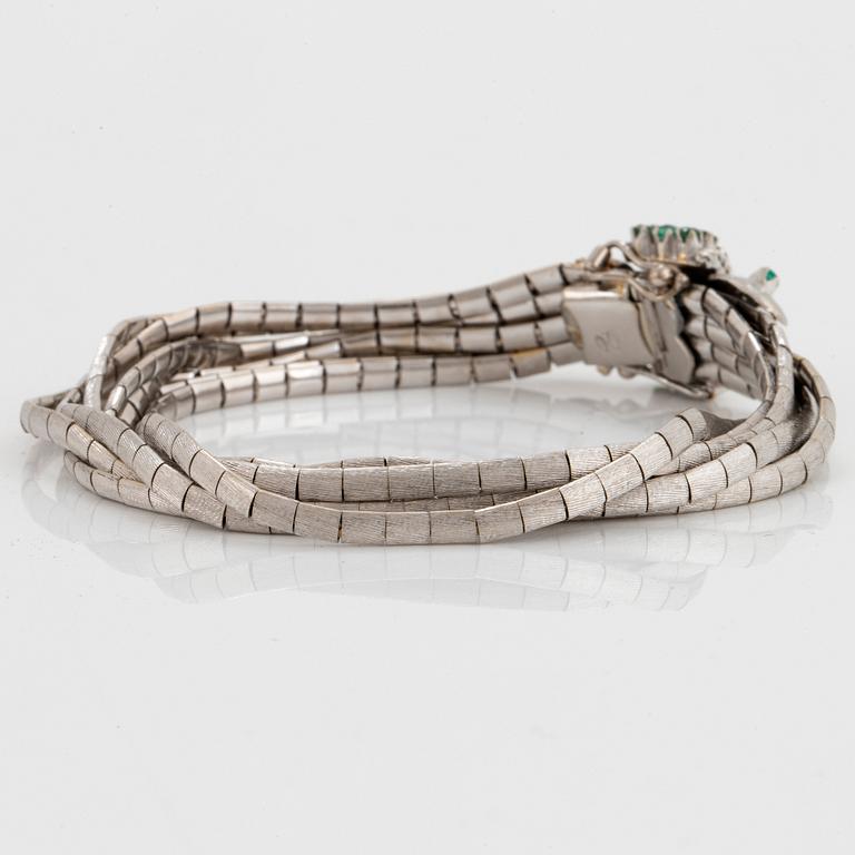 Armband 18K vitguld med fasettslipade smaragder.