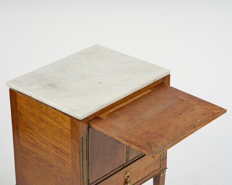 A late Gustavian mahogany chamberpot cupboard, circa 1800.