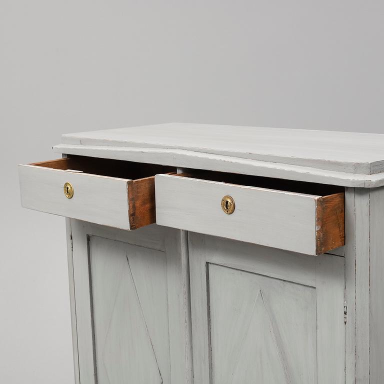 A mid 19th Century painted cupboard.