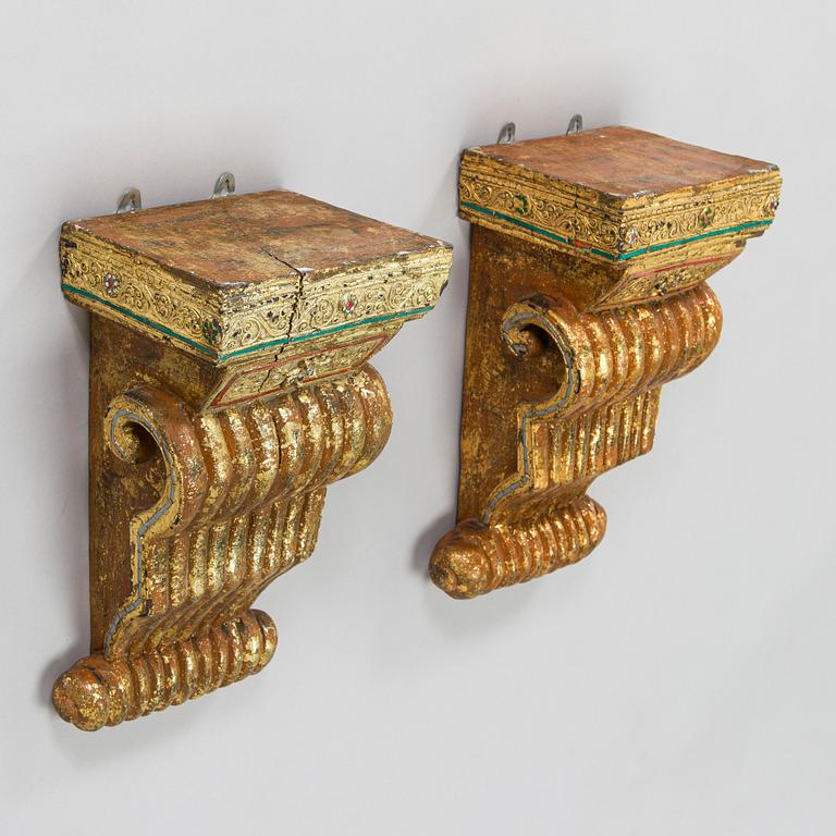 A pair of Southeast Asian temple consoles. Early 20th century.