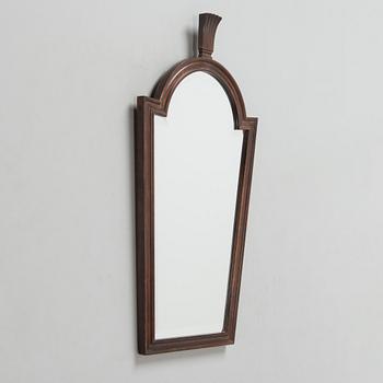 A 1930s Art Deco mirror.