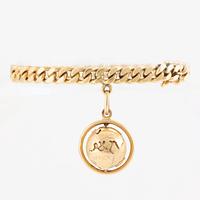 Bracelet with a charm in the shape of a globe, 18K gold, curb chain.