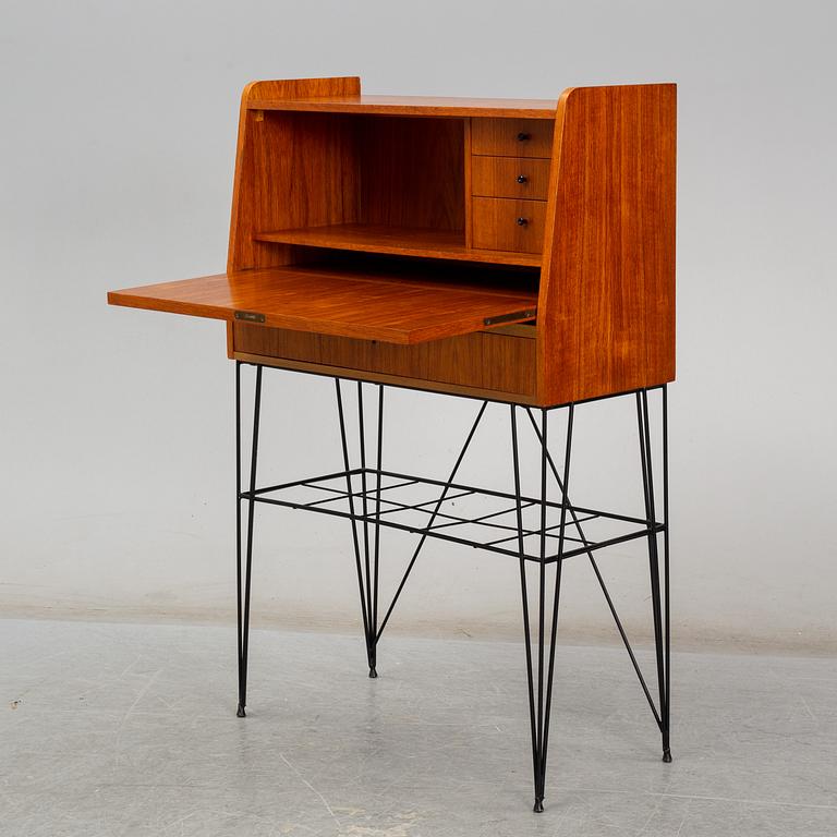 A Swedish teak veneered 'Bang' secretaire, circa 1960s, from Ikea.